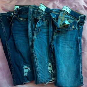 Three pairs of size 7/8 long Abercrombie kids girls skinny jeans.